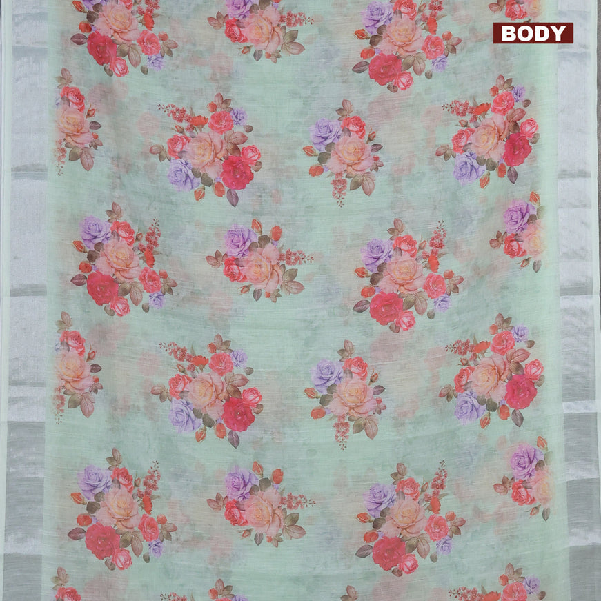 Linen cotton saree teal shade with allover floral butta prints and silver zari woven border