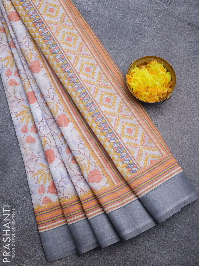 Linen cotton saree pastel grey and grey with allover prints and silver zari woven border