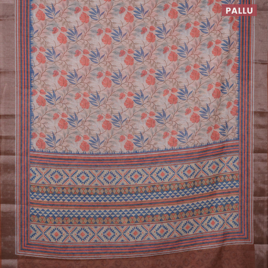 Linen cotton saree pastel peach and brown with allover prints and silver zari woven border