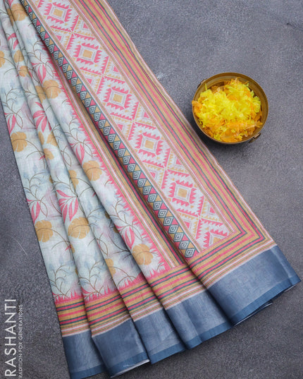 Linen cotton saree teal blue and blue with allover prints and silver zari woven border