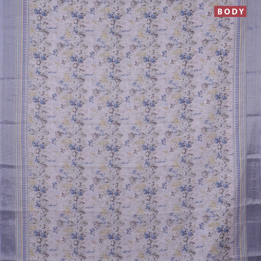 Linen cotton saree off white and pastel blue with allover floral prints and silver zari woven border