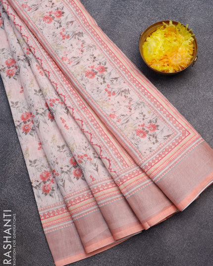 Linen cotton saree mild peach orange with allover floral prints and silver zari woven border