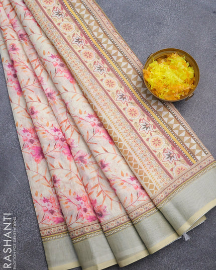 Linen cotton saree cream and yellow shade with allover floral prints and silver zari woven border