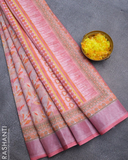 Linen cotton saree pink shade with allover prints and silver zari woven border