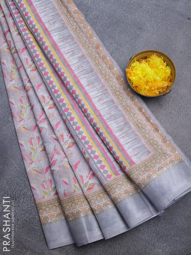 Linen cotton saree pastel grey with allover prints and silver zari woven border