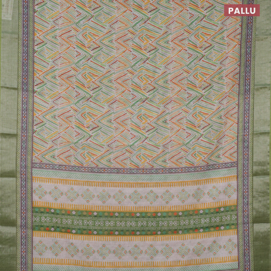 Linen cotton saree off white and light green with allover geometric prints and silver zari woven border