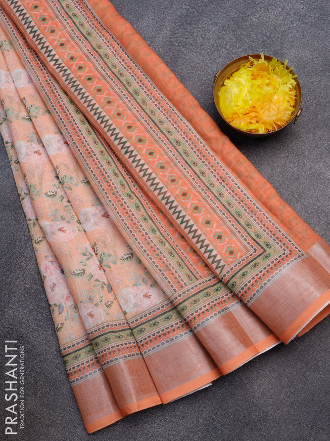 Linen cotton saree orange with allover floral prints and silver zari woven border