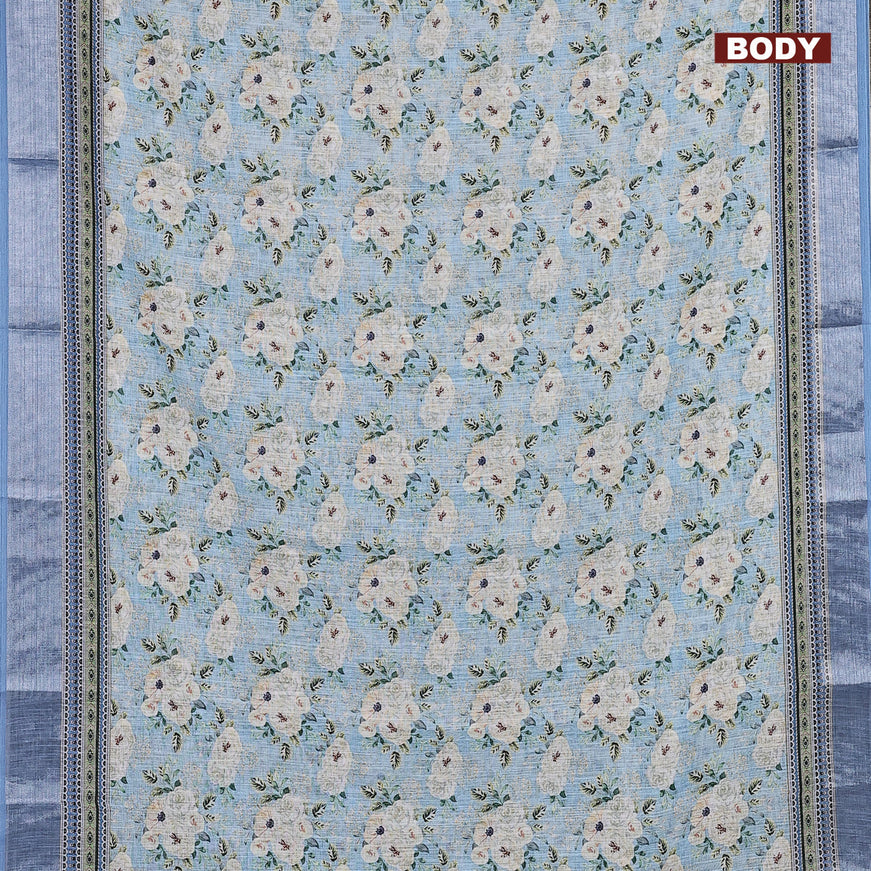 Linen cotton saree blue with allover floral prints and silver zari woven border