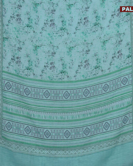 Linen cotton saree teal blue with allover prints and silver zari woven border
