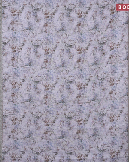 Linen cotton saree grey shade with allover prints and silver zari woven border