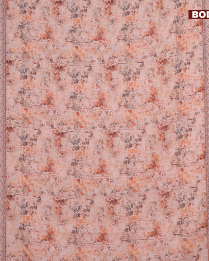 Linen cotton saree peach orange with allover prints and silver zari woven border