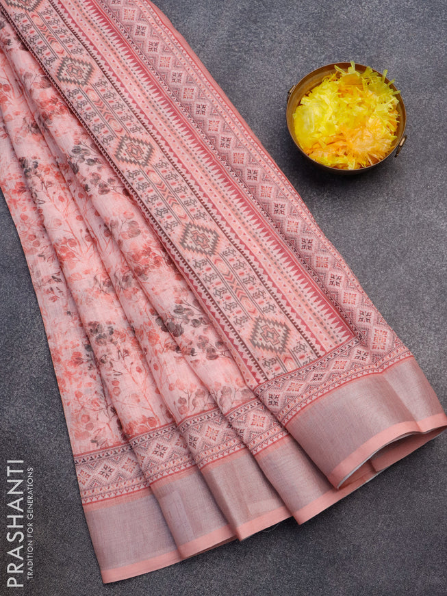 Linen cotton saree peach shade with allover prints and silver zari woven border