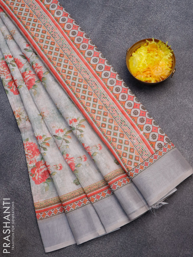 Linen cotton saree grey shade and grey with allover floral prints and silver zari woven border