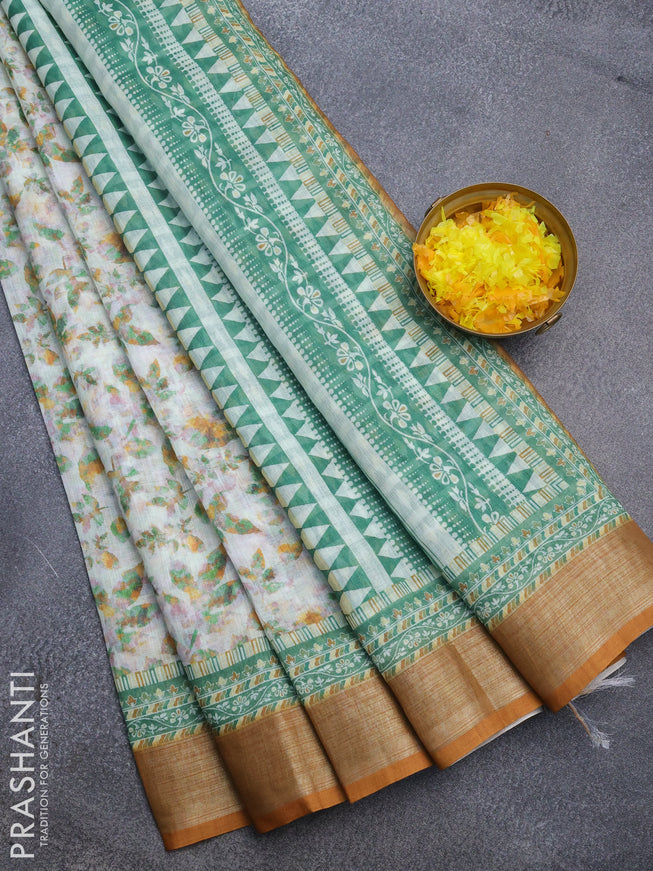 Linen cotton saree off white and dark mustard with allover leaf prints and silver zari woven border