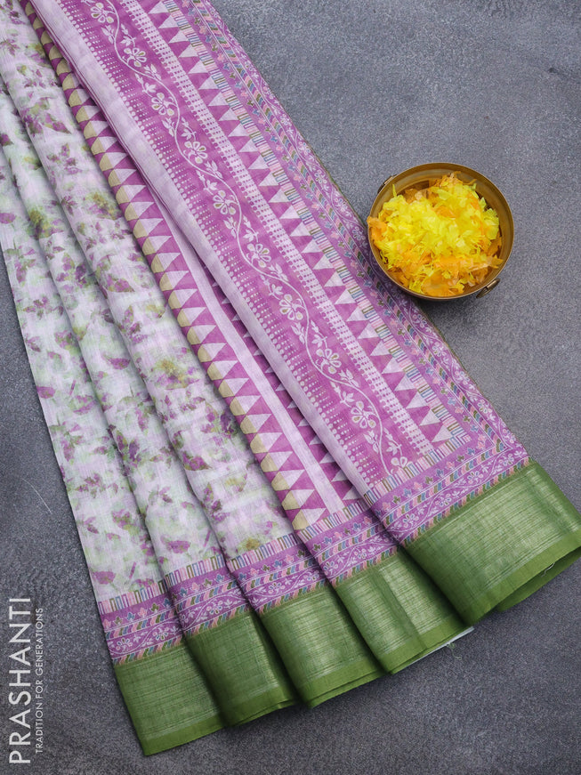 Linen cotton saree off white and green with allover leaf prints and silver zari woven border