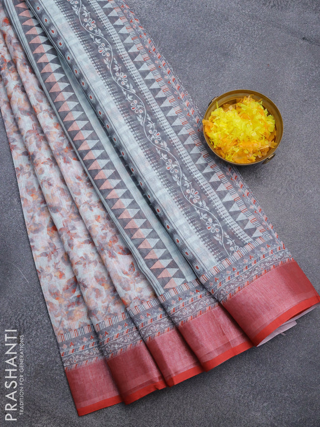 Linen cotton saree off white and rustic maroon with allover leaf prints and silver zari woven border