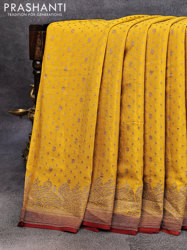 Pure banarasi crepe silk saree mustard yellow and rustic brown with allover thread & zari woven floral butta weaves and paisley woven border
