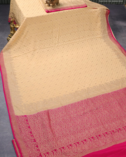 Pure banarasi crepe silk saree sandal and pink with allover thread & zari woven floral butta weaves and paisley woven border