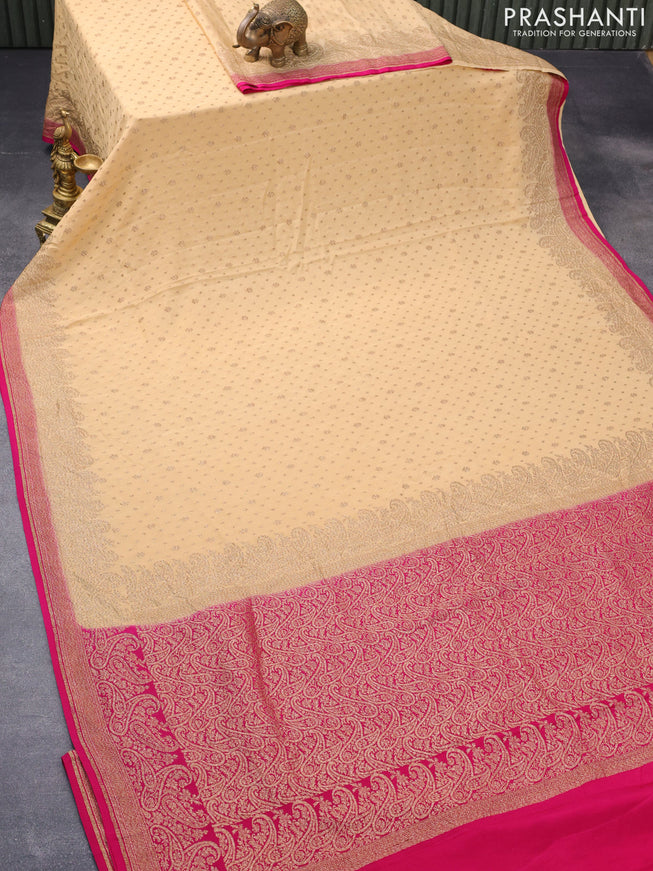 Pure banarasi crepe silk saree sandal and pink with allover thread & zari woven floral butta weaves and paisley woven border