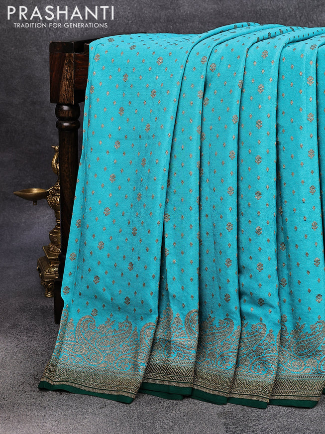 Pure banarasi crepe silk saree teal blue and green with allover thread & zari woven floral butta weaves and paisley woven border
