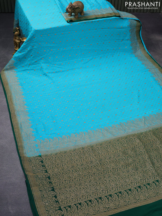 Pure banarasi crepe silk saree teal blue and green with allover thread & zari woven floral butta weaves and paisley woven border