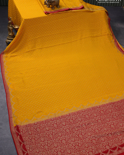 Pure banarasi crepe silk saree mango yellow and maroon with allover thread & zari woven butta weaves and woven border