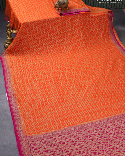 Pure banarasi crepe silk saree orange and magenta pink with allover thread & zari woven brocade weaves and woven border