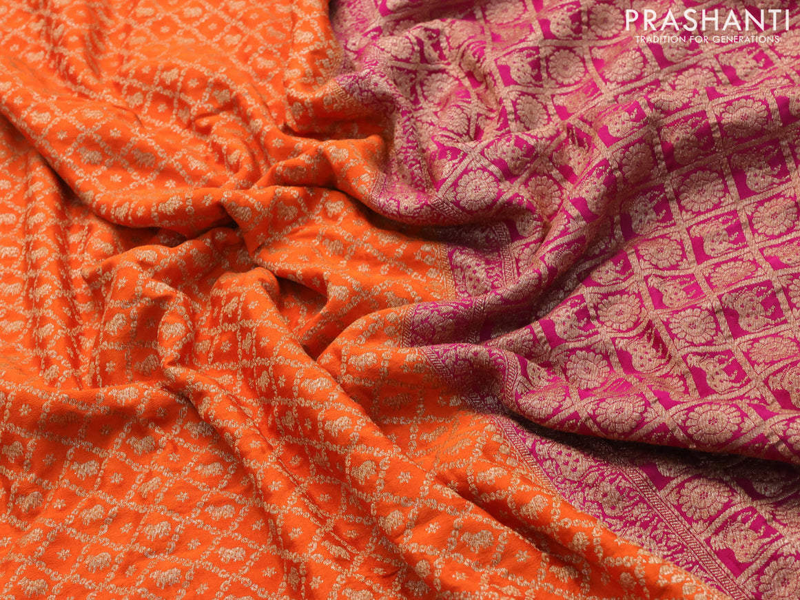 Pure banarasi crepe silk saree orange and magenta pink with allover thread & zari woven brocade weaves and woven border