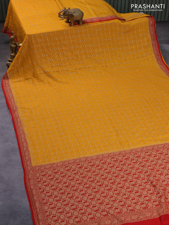Pure banarasi crepe silk saree mustard yellow and red with allover thread & zari woven brocade weaves and woven border