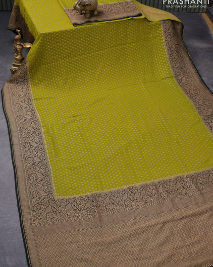 Pure banarasi georgette silk saree mehendi green and black with allover thread & zari woven floral butta weaves and rich woven border