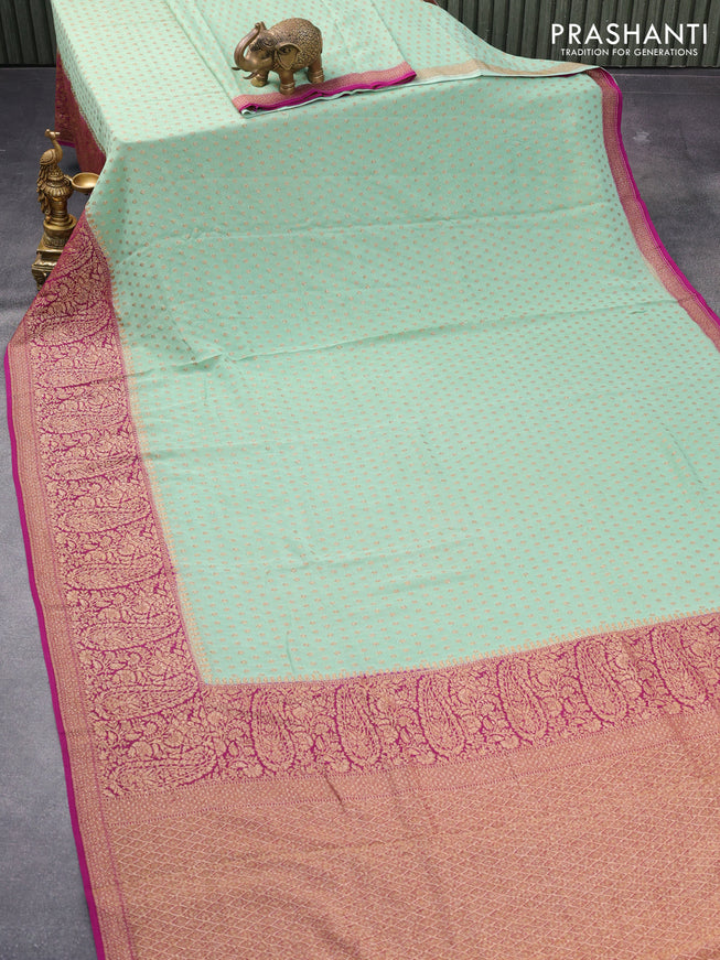 Pure banarasi georgette silk saree pastel green and purple with allover thread & zari woven floral butta weaves and long woven border