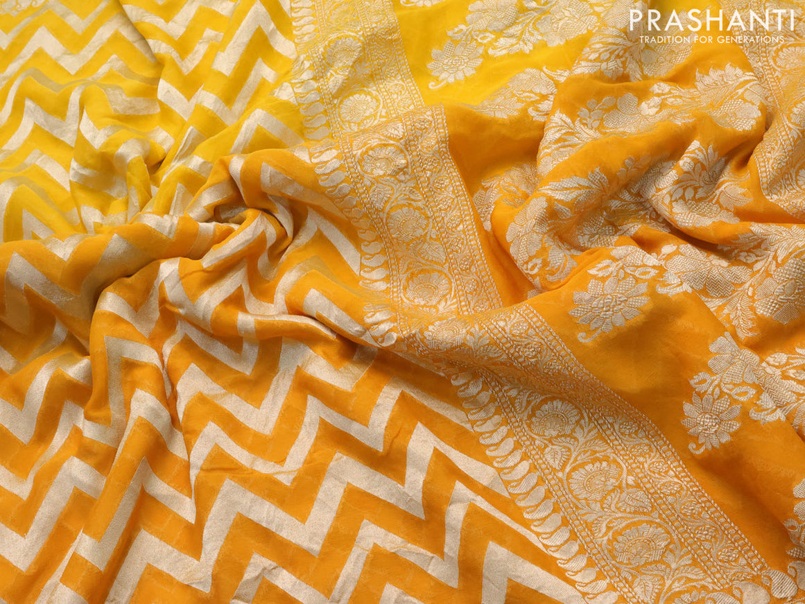 Pure banarasi georgette silk saree yellow and mango yellow with allover zari woven zig zag weaves and zari woven border