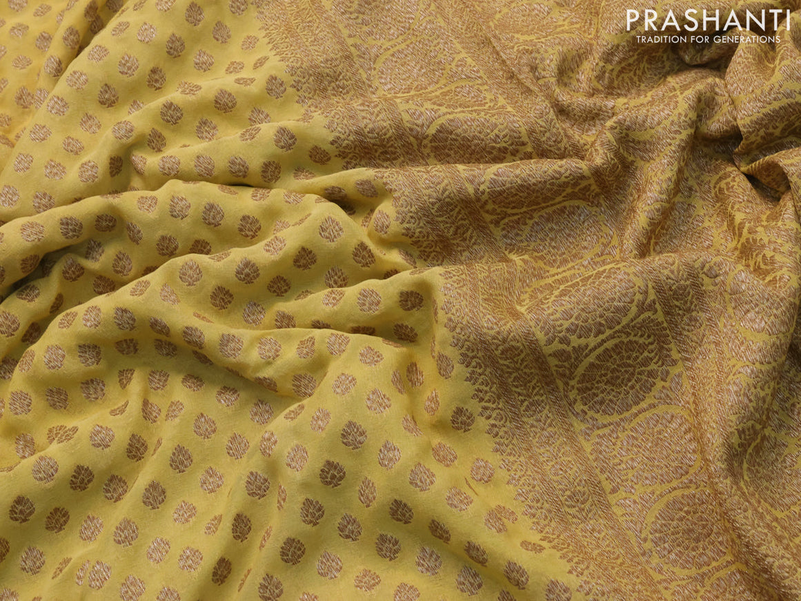 Pure banarasi georgette silk saree pale yellow and grey with allover thread & zari woven butta weaves and woven border