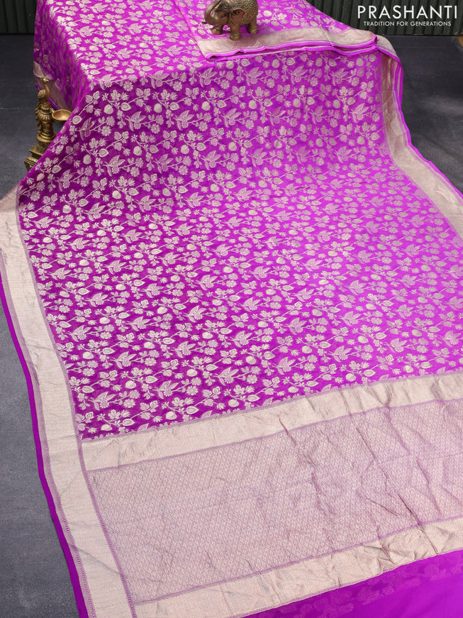 Pure banarasi georgette silk saree purple with allover zari woven floral brocade weaves and rich zari woven border