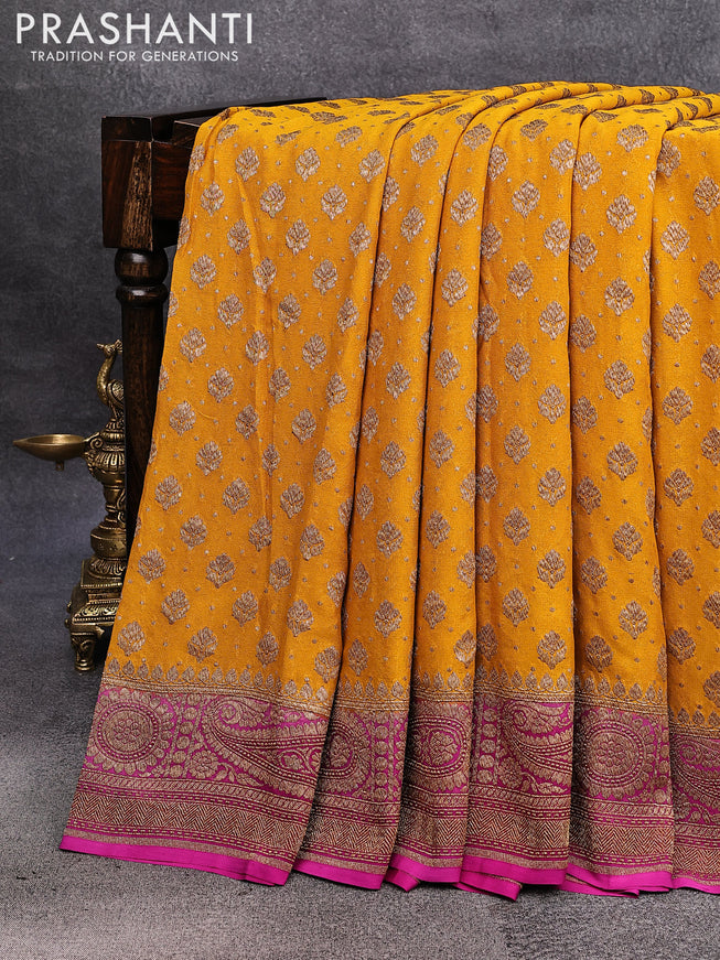 Pure banarasi georgette silk saree mustard yellow and pink with allover thread & zari butta weaves and woven border