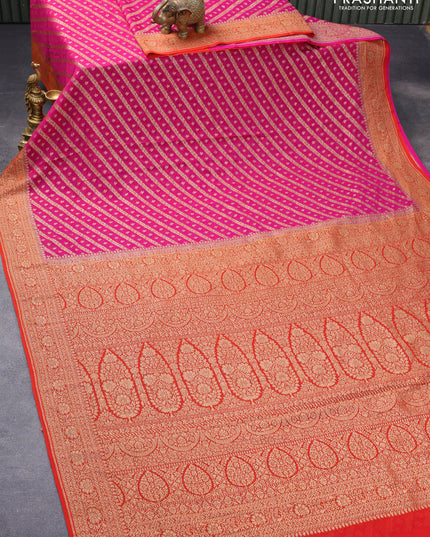 Pure banarasi georgette silk saree magenta pink and orange with allover thread & zari weaves and woven border