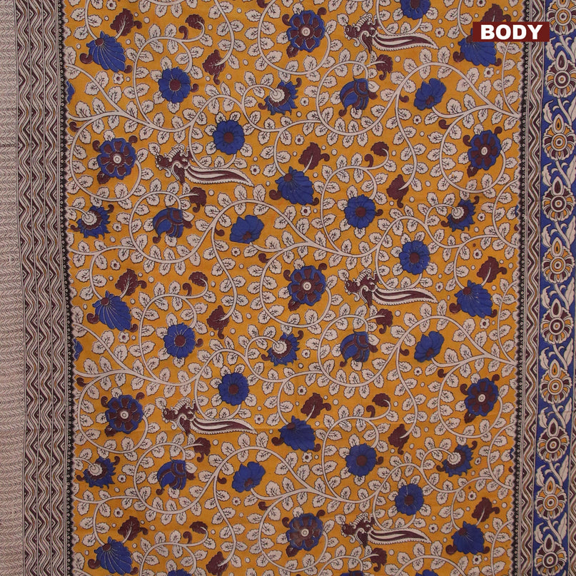 Kalamkari cotton saree mustard yellow and blue with allover prints and printed border