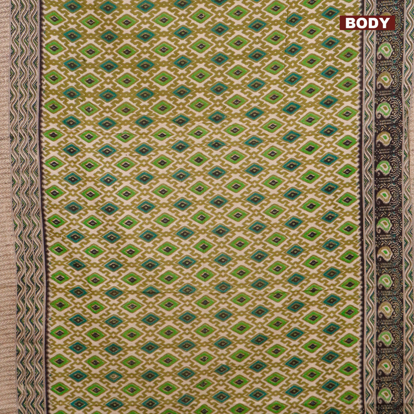 Kalamkari cotton saree beige green and black with allover ikat weaves and printed border