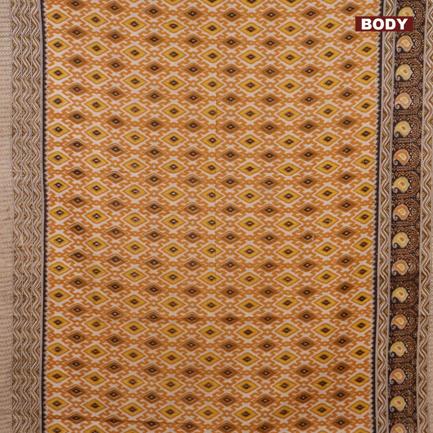 Kalamkari cotton saree beige mustard yellow and black with allover ikat weaves and printed border