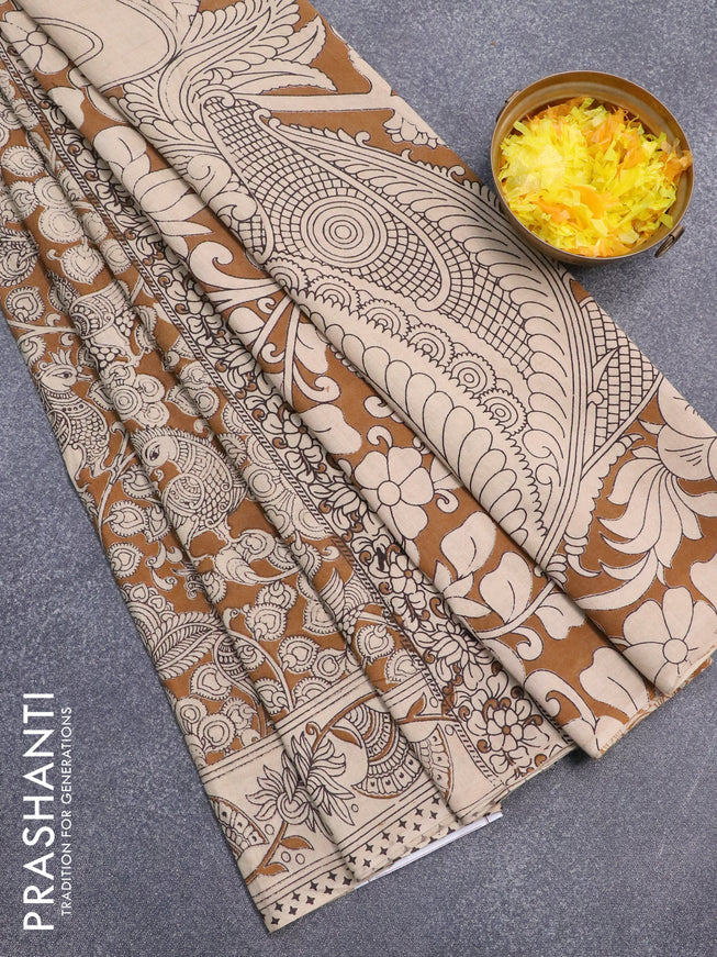 Kalamkari cotton saree dark mustard and beige with allover prints and printed border