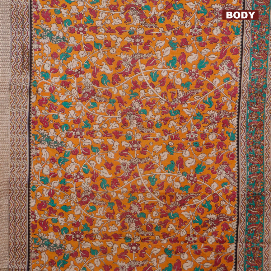 Kalamkari cotton saree orange and teal green with allover prints and printed border