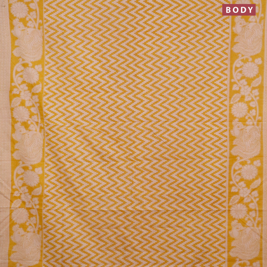 Kalamkari cotton saree beige and yellow with allover zig zag prints and printed border