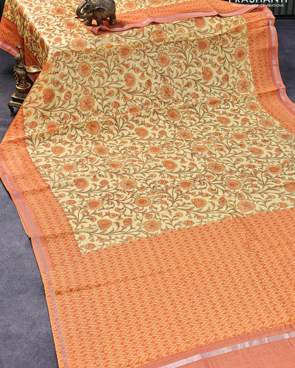 Chanderi silk cotton saree pale yellow and orange with allover floral prints and small zari woven border