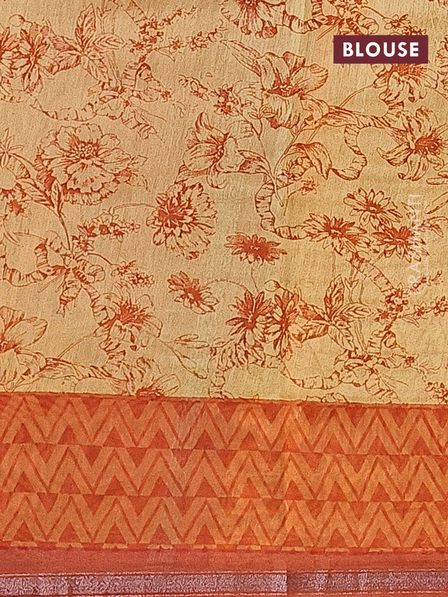 Chanderi silk cotton saree pale yellow and orange with allover floral prints and small zari woven border