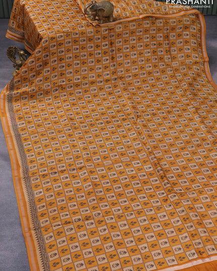 Chanderi silk cotton saree mustard yellow with allover floral butta prints and small zari woven border