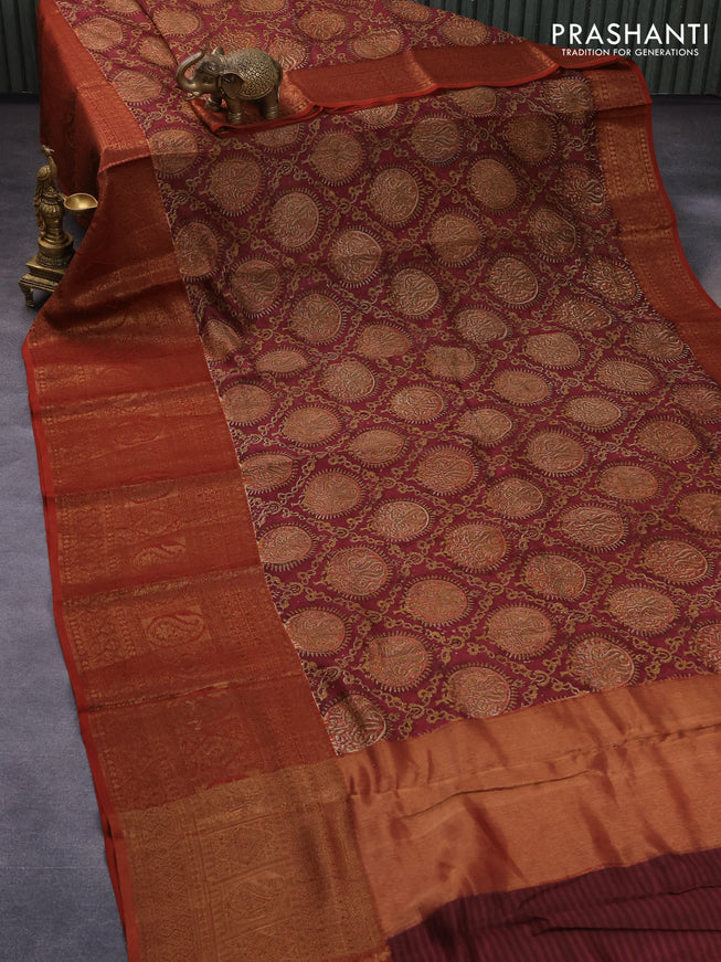 Chanderi silk cotton saree maroon and rustic orange with allover prints and long banarasi style border