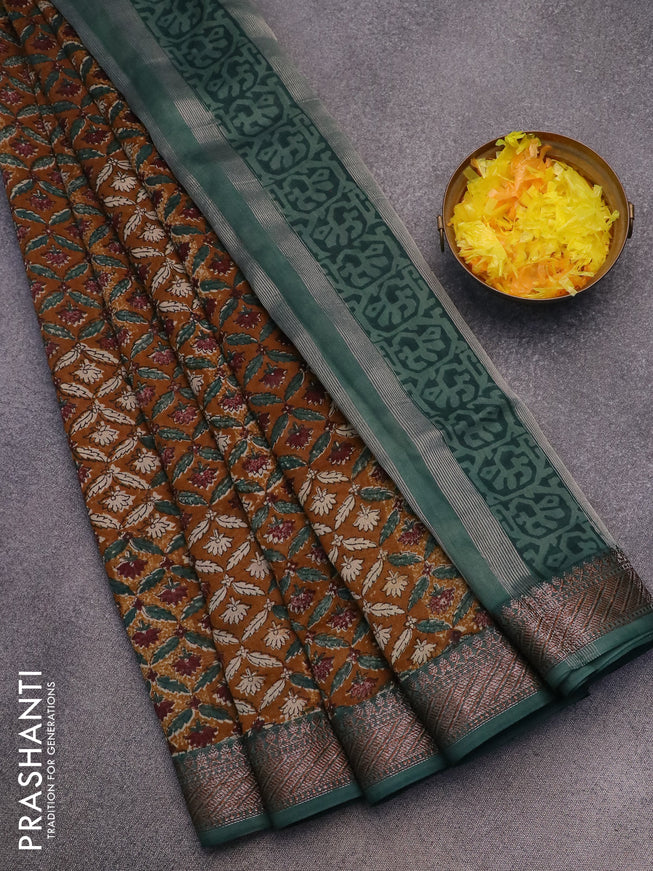 Chanderi silk cotton saree dark mustard and green shade with allover prints and woven border