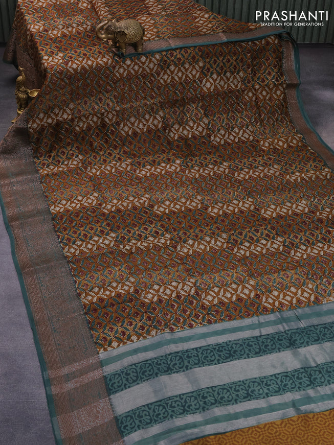 Chanderi silk cotton saree dark mustard and green shade with allover prints and woven border