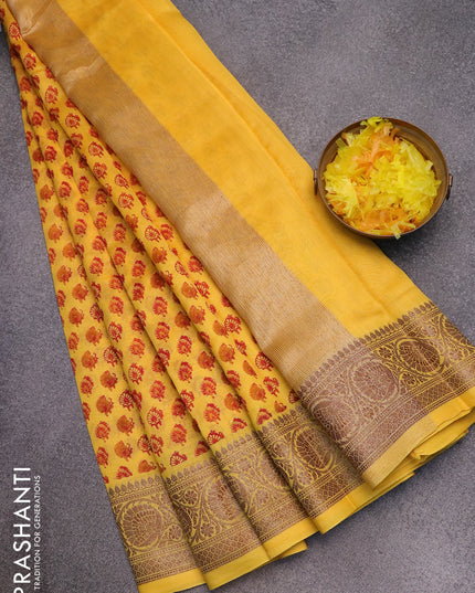 Chanderi silk cotton saree yellow with allover butta prints and woven border