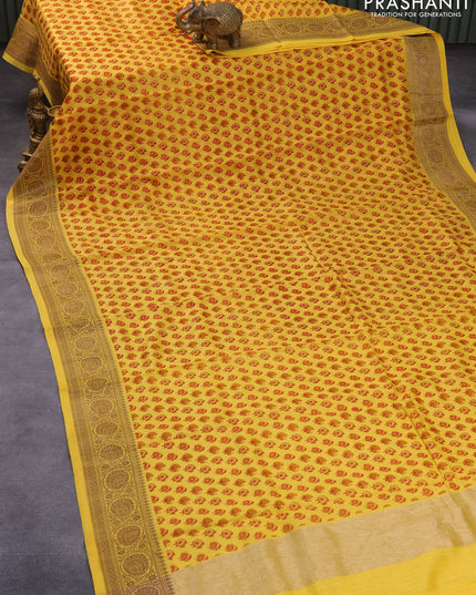 Chanderi silk cotton saree yellow with allover butta prints and woven border